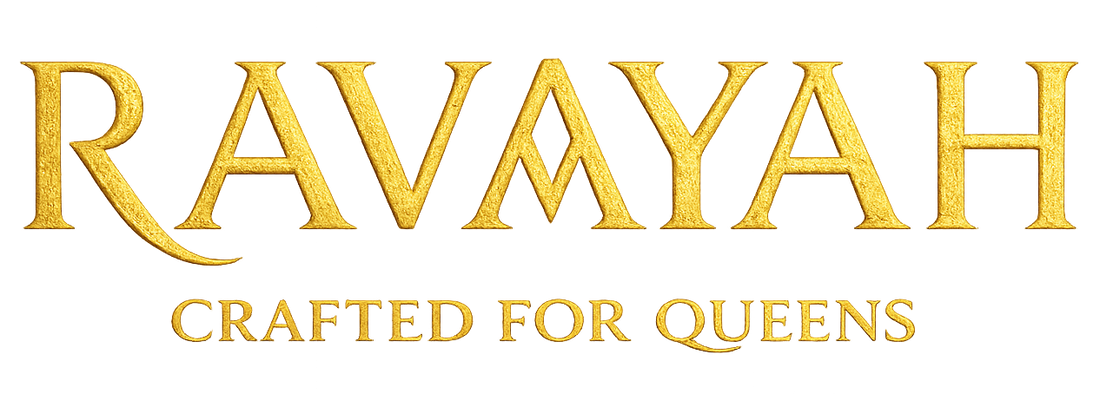 Gold metallic-style text reading 'RAVAYAH' with the smaller phrase 'CRAFTED FOR QUEENS' underneath, centered on a plain white background.